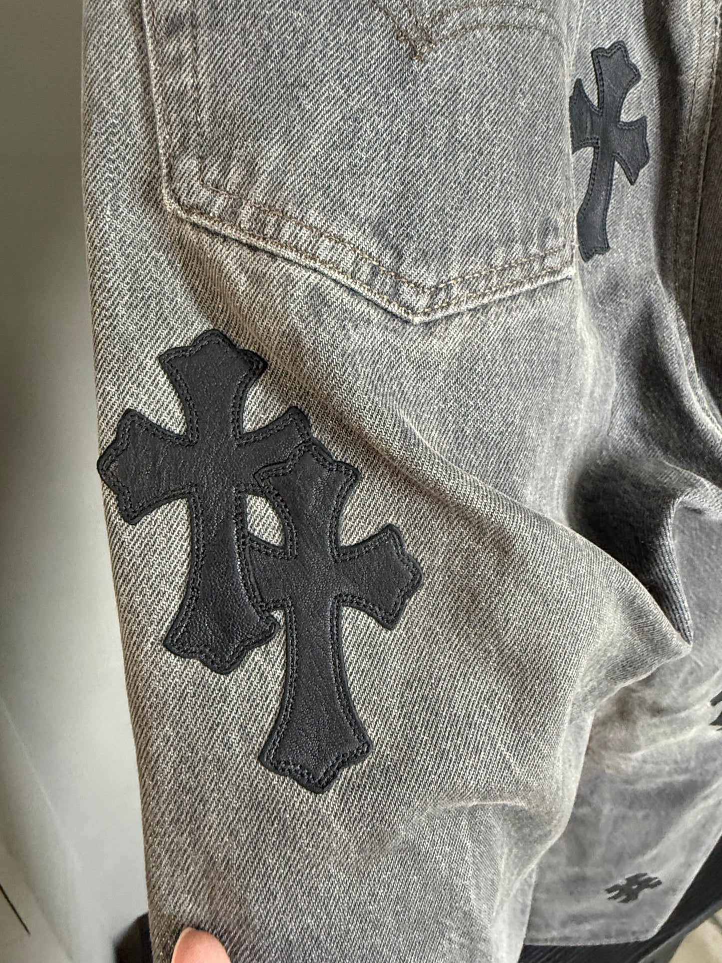 Chrome Hearts leather patched jeans