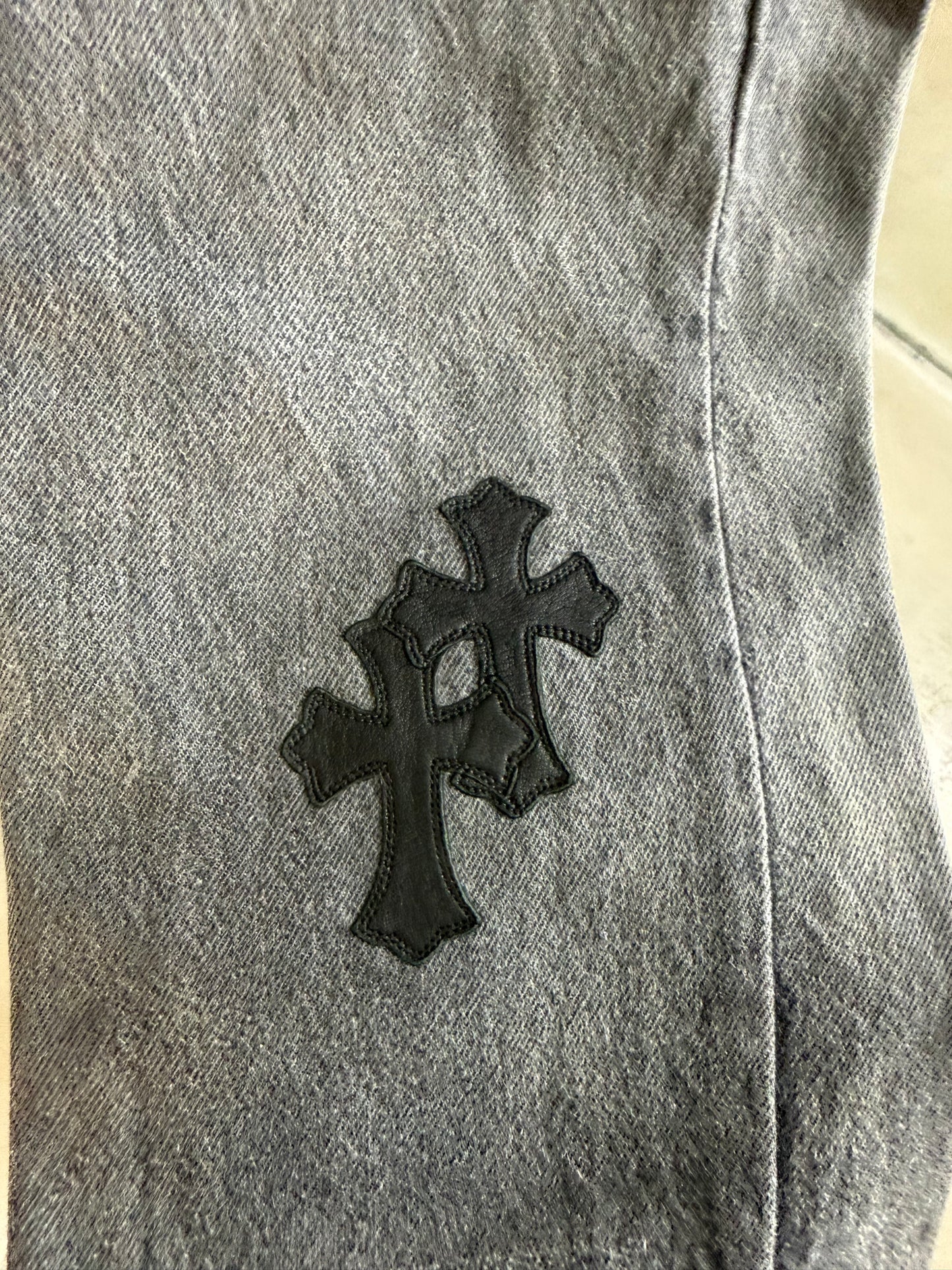Chrome Hearts leather patched jeans
