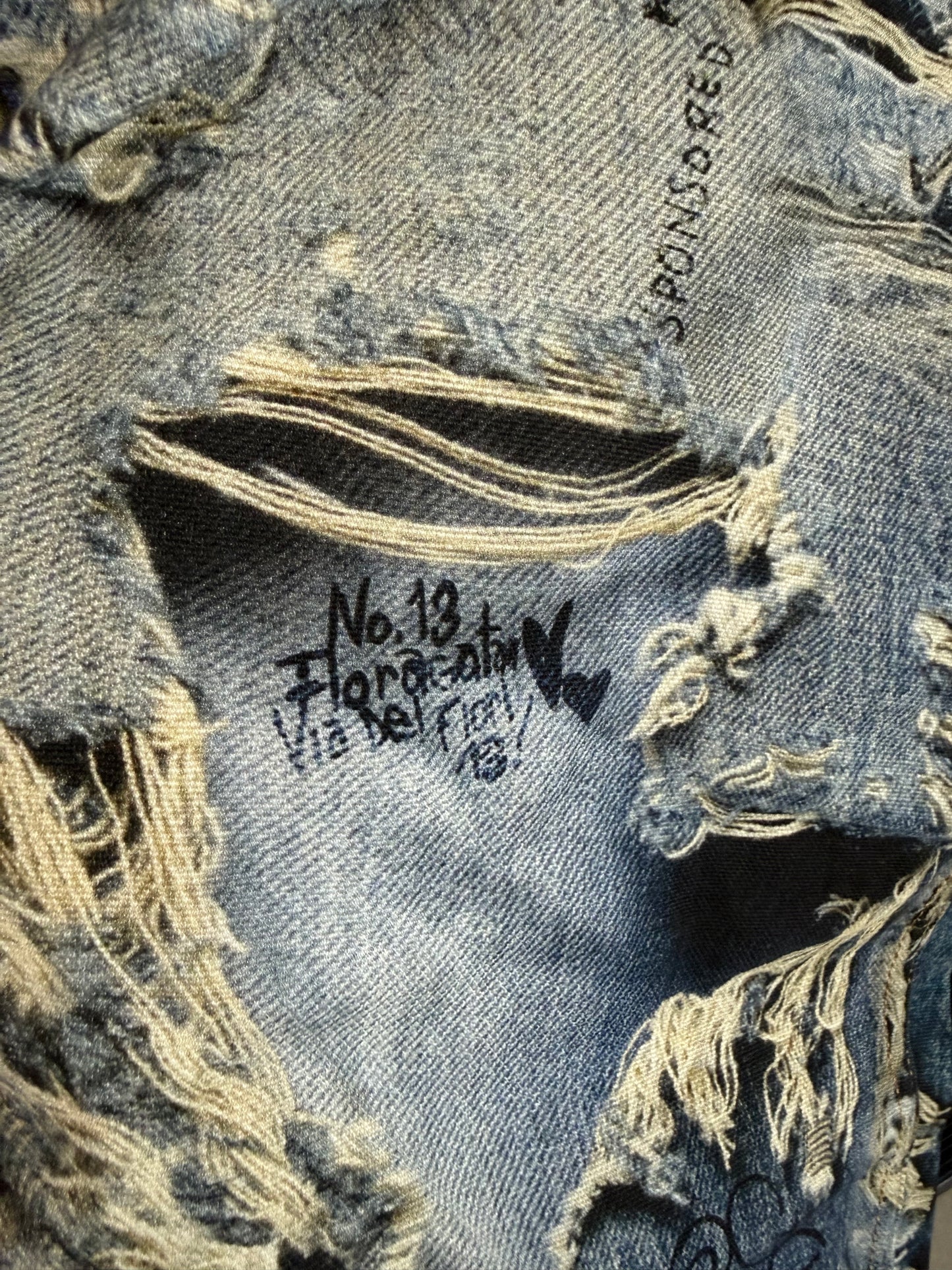 Acne Studios Printed ripped jeans
