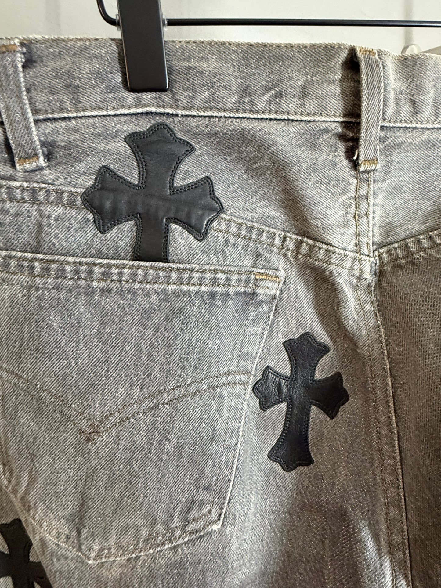 Chrome Hearts leather patched jeans