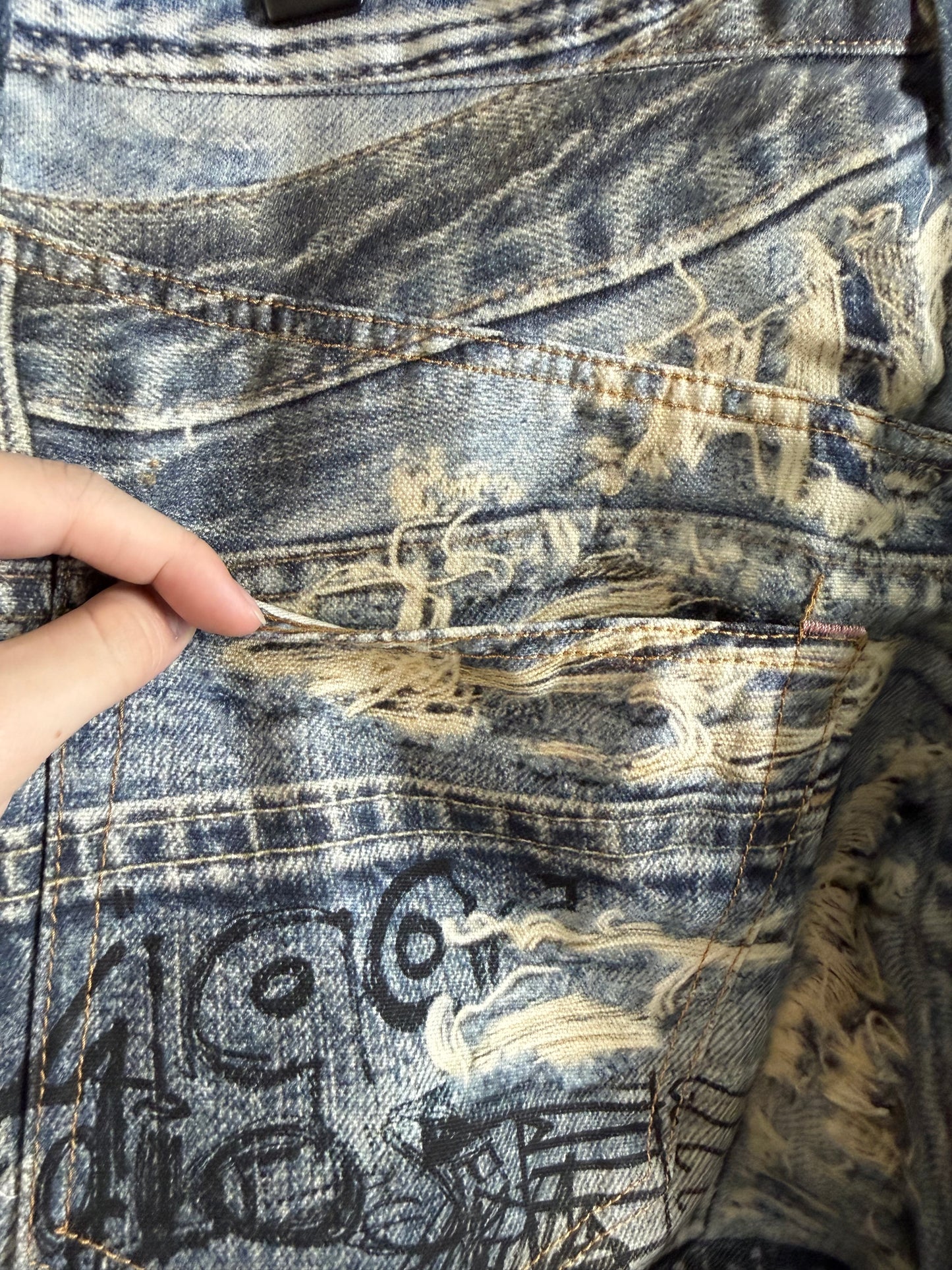 Acne Studios Printed ripped jeans